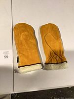 Full view of both suede mittens