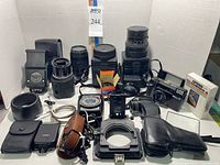 Overall view of all vintage photography items spread on table