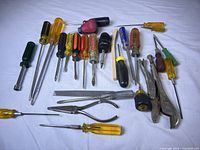 Full lot overview showing screwdrivers, pliers, files, brush