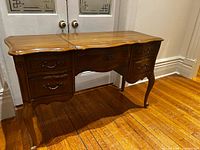 full front view of wooden dressing table