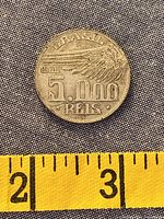 Reverse of 1936 Brazil 5000 Réis coin showing wing and denomination