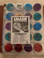 binder page of metallic foil slammers with Smash Wayne Gretzky checklist