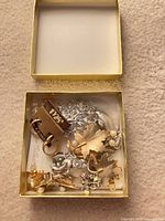 Open jewellery box showing assorted pieces