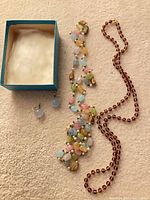 Bead bracelet, pink necklace, blue stud earrings and box