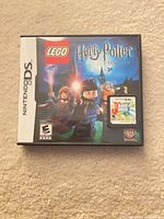 LEGO Harry Potter DS case front and Band Hero cartridge in front