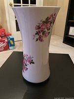 Full view of Royal Kent porcelain vase showing floral design
