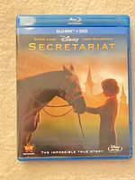 Front cover showing title, stars, Blu-ray + DVD label, sealed wrapping