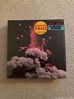 Front of sealed CD showing cover art, Tower Records sticker and shrink wrap