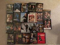 All twenty DVD cases laid out face-up