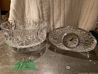 Clock and bowl side by side