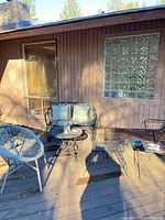 Full patio set showing all six pieces on deck