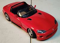 Left front perspective of red Dodge Viper RT/10 model