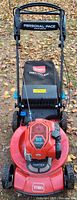 Front view of Toro Personal Pace Recycler mower showing deck, engine, handle