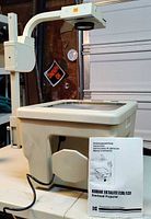 Overhead projector with manual on table