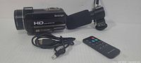 Camcorder with microphone, USB cable and remote