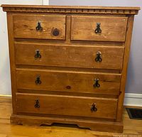 Front view of solid pine five-drawer dresser