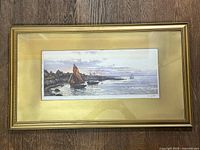 Full view of framed etching showing frame style and overall appearance