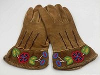 top view of both gloves showing beadwork, finger backs and cuff detailing