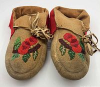 Top view showing both moccasins and bead floral motif