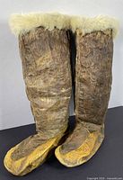 Full view of both mukluks standing upright