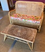 Loveseat front with floral cushion and matching coffee table