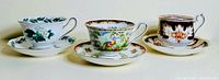 Group shot of three Royal Albert teacups with saucers