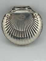 Top view showing Gorham Sterling 906 hallmark and shell form