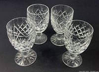 Group of four Waterford cut crystal goblets