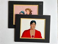 Both matted animation cels stacked to show lot contents