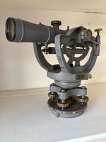 Left view of transit showing telescope and base