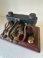 Oblique view of telegraph sounder showing coils, armature and wiring