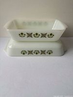 Both casserole dishes stacked to show pattern and size comparison