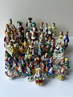 Front view of entire assortment of hand painted porcelains