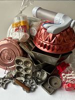 Group view of all vintage baking items piled together