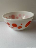 Side view of Hazel Atlas bowl showing orange dots pattern
