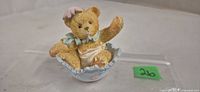 Front view of Cherished Teddies Bunny figurine in eggshell