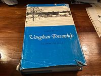 Front dust jacket of the book showing title and wear