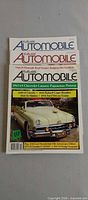 Front covers of three Collectible Automobile magazines stacked
