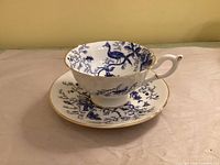 Cup on saucer showing overall design and handle