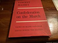 Front cover showing title, author, subtitle on red dust jacket