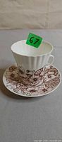 cup on saucer showing lily pad artwork