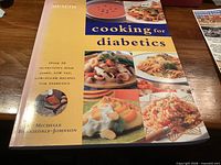 Front cover of cookbook showing title, series, author and food images