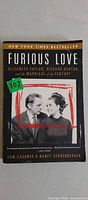 Front cover of Furious Love paperback