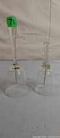 Both clear glass bells side by side