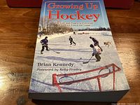 Front cover of Growing Up Hockey paperback