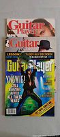 Stacked view of all three Guitar Player magazines