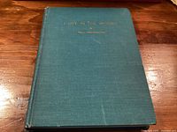 Front cover of teal cloth hardcover book