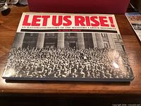 Front cover showing title, subtitle, author and crowd photo