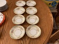 Eight matching Noritake Jasmine bowls arranged on table