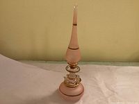 Full view of assembled perfume bottle showing height and color